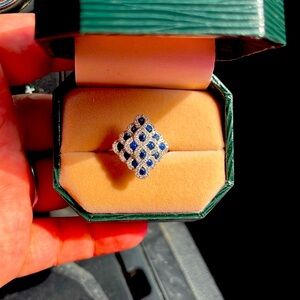 14k white gold ring with sapphires and diamonds.